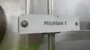 213.350 Liter Lagertank/ Milchtank rund, stehend, isoliert aus V2A mit seitlichem Rührwerksmixer mit Propeller 